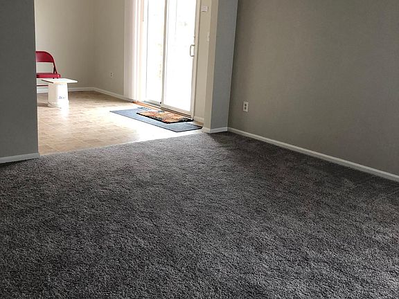 Living Room looking toward Kitchen Nook and Patio Door to Deck