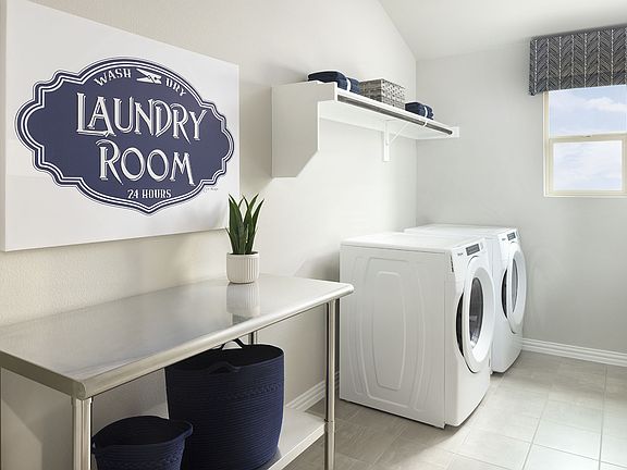 Enjoy the spacious laundry room
