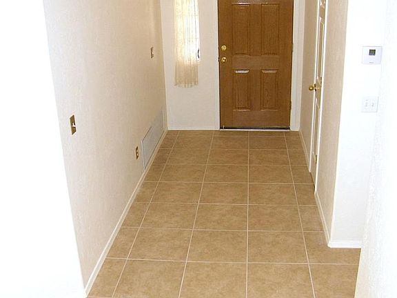 The entry has ample space. It's got a coat closet on the rig