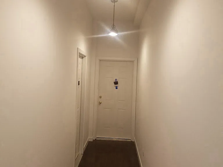 Hallway to unit (on left)