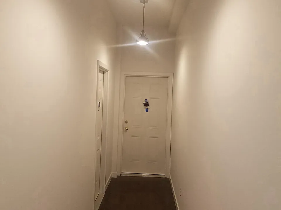 Hallway to unit (on left)