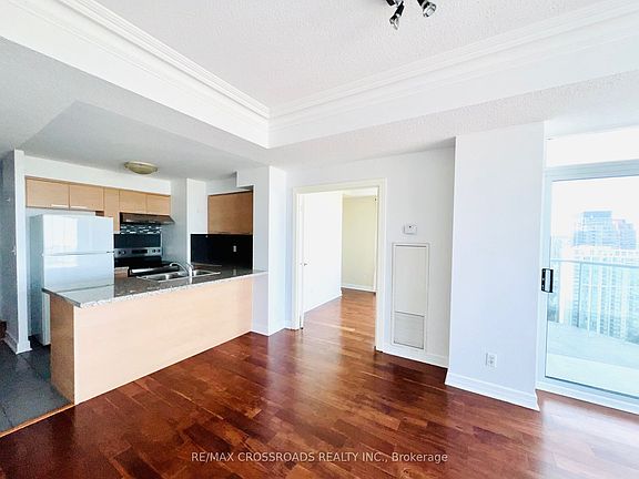 4th image of 16 Harrison Garden Blvd #Penthouse 10