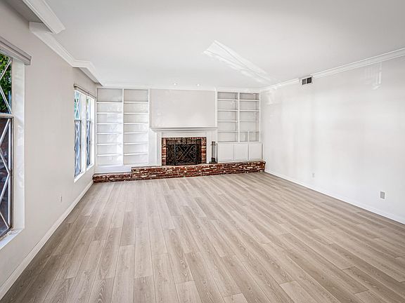 Living Room with Gas & Wood burning Fire Place