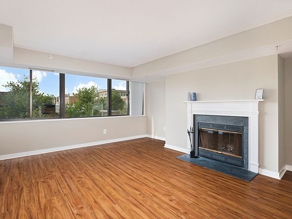 Two-bedroom apartment living area with fireplace