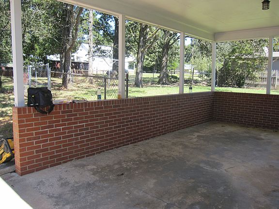 Carport and Fenced back yard