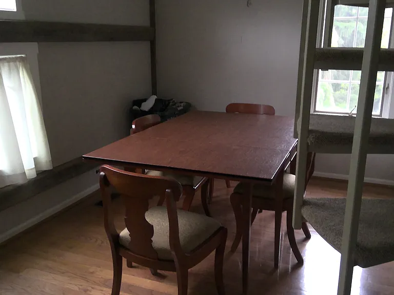 Dining room (can be combination living/dining room). Windows and beautiful views throughout.
 Circular stair to loft