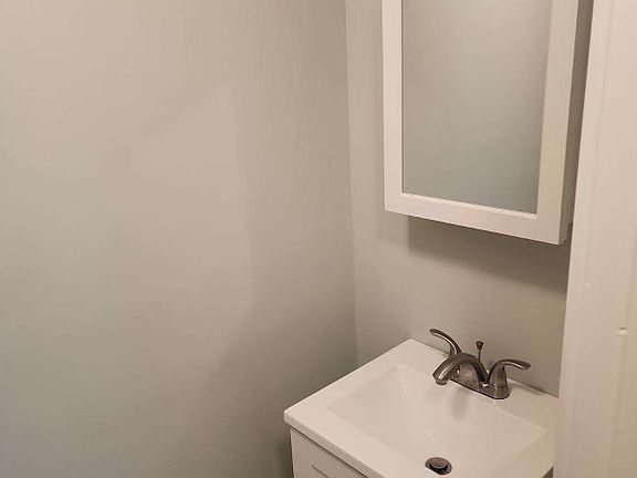 First floor offers convenient half bath (with full bath located upstairs)