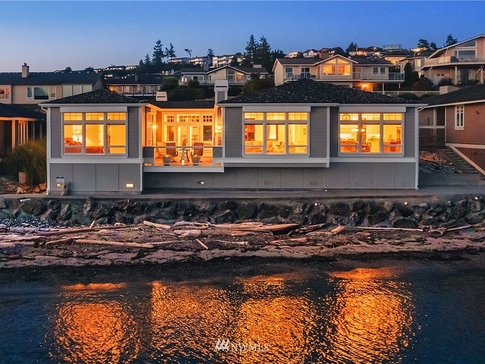 Welcome to 5009 Croatian Way. Resort Like Living at the Water's Edge! 85 Ft of Stunning Low Bank, Bulkhead Waterfront.