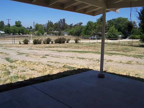 view of .66 acre looking from back covered patio