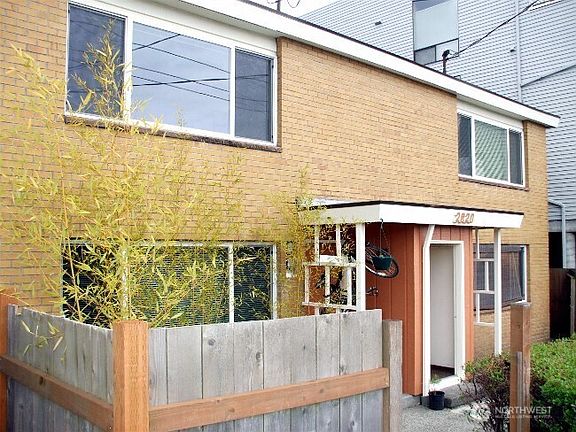 Each Unit features 2 entrances: 1 Entrance in front (leading into the living rm), 1 Entrance on the side (lower level Units) off Kitchen, or 1 Entrance in the back (Upper level Units) off Primary bedroom. Large fenced-in patio area in front & on sides of bldg.>