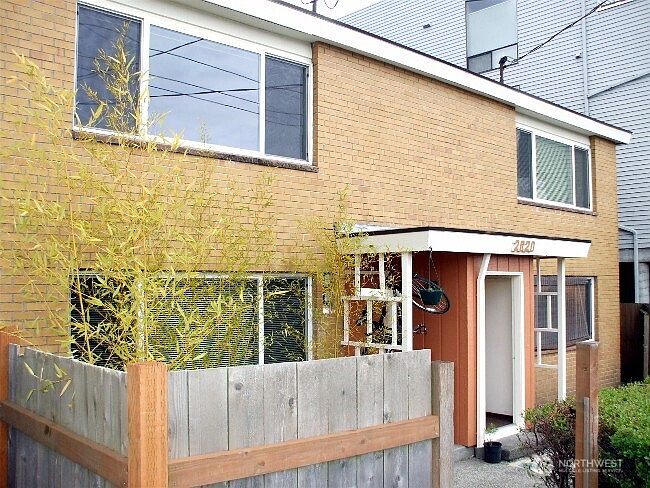 Each Unit features 2 entrances: 1 Entrance in front (leading into the living rm), 1 Entrance on the side (lower level Units) off Kitchen, or 1 Entrance in the back (Upper level Units) off Primary bedroom. Large fenced-in patio area in front & on sides of bldg.>