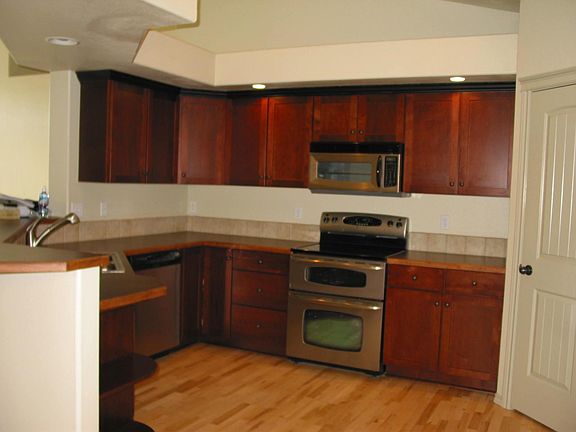 Kitchen. Older picture. Currently being remodeled. New countertops, backspash and restored cabinets.