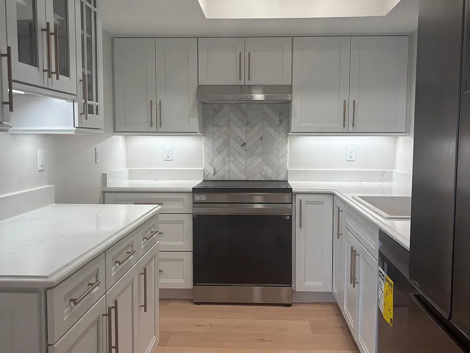 Fully equipped kitchen with brand-new, never-used appliances _ dishwasher, oven, fridge all included.