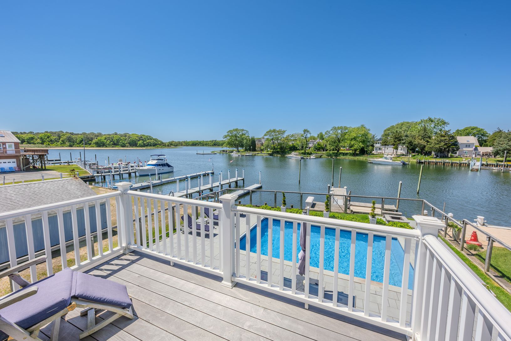  Primary Private deck overlooking the water facing west with great sunset views