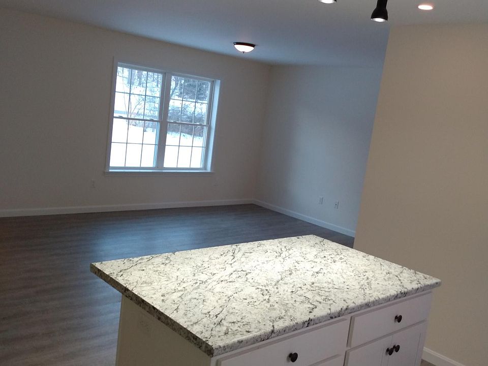 Large open concept kitchen island, livingroom.