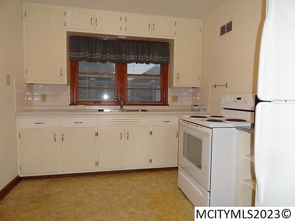 4th image of 666 9th St NE