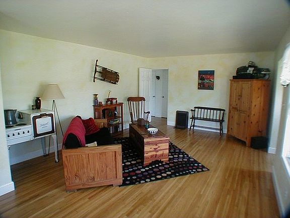 Living Room With Hardwood Flooring and Custom Paint