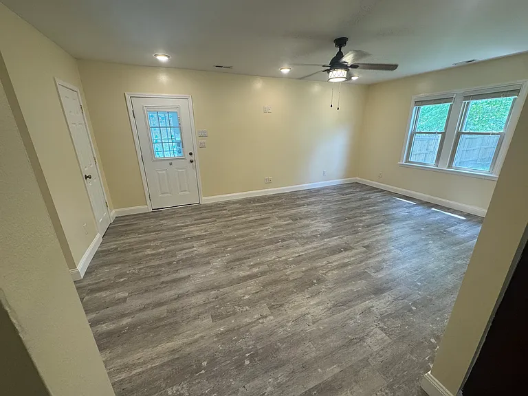 Living room _ Bright living room with LVP flooring and ceiling fan