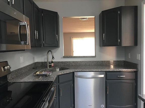 Breakfast bar on the other side of window, facing the french window