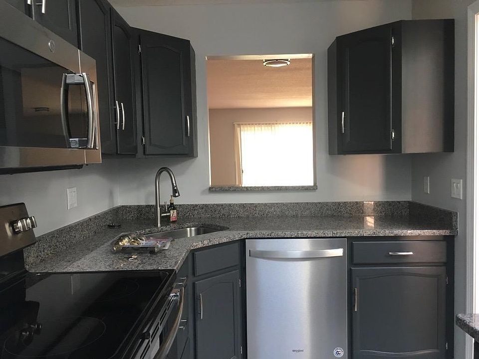 Breakfast bar on the other side of window, facing the french window