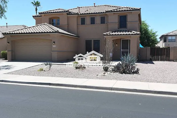 9791 W Butler Dr — Photo 1