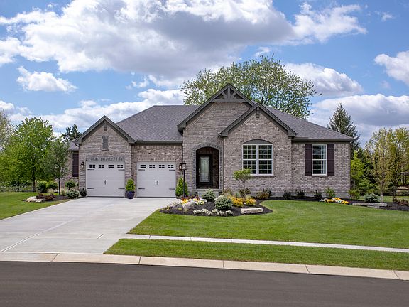custom home with brick exterior