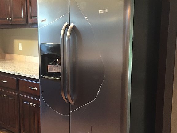 Stainless steel side-by-side frig