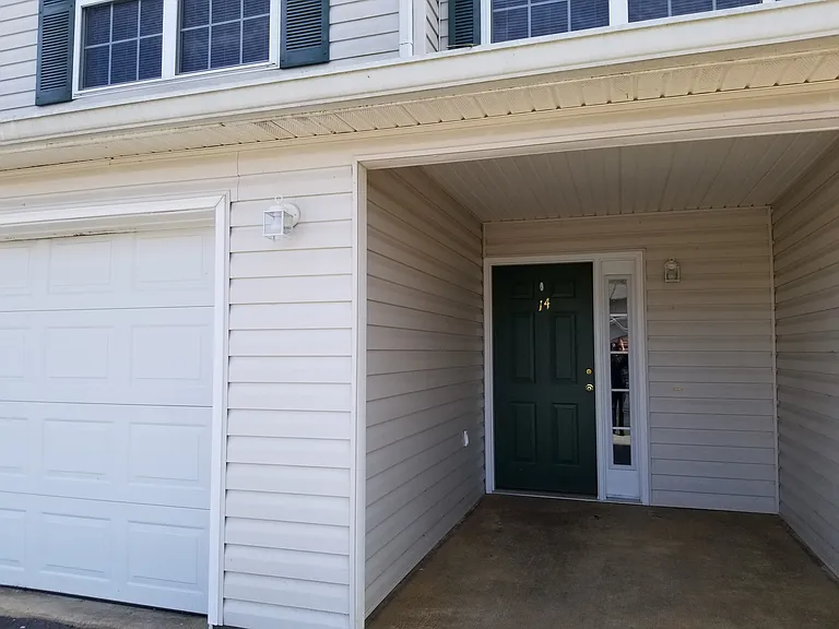 C14 FRONT ENTRANCE WITH COVERED PORCH