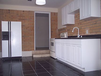 Brand new tiles and cabinets