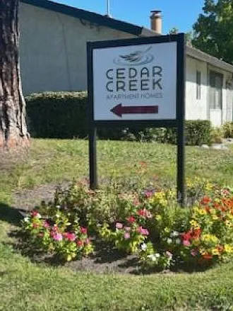 Cedar Creek Apartments directional sign