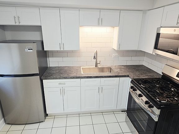 2nd image of 11013 S Lloyd Dr APT 6