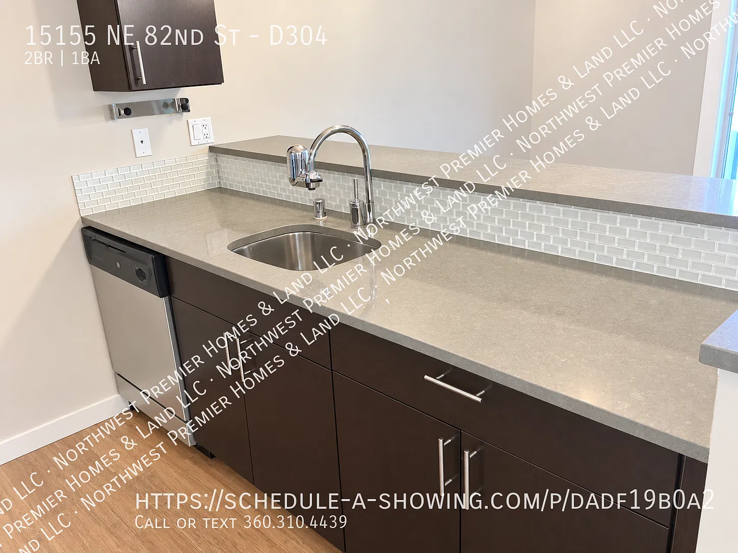 Top-Floor Corner Condo with 2 Parking Spaces & Utilities Included — Photo 4