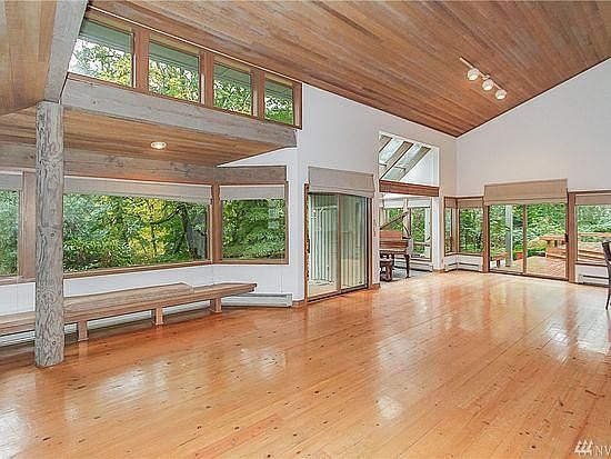 Spacious main room with high ceilings and a lot of natural light.