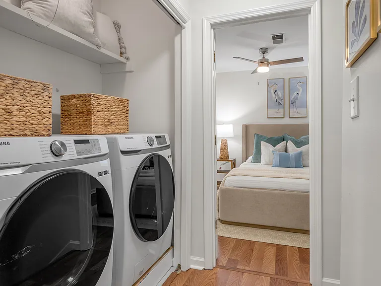 High efficiency washer/dryer on pedestals