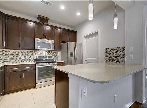 Modern kitchen with SS Appliances