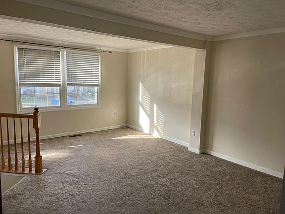 Main living room, stairs to the front foyer