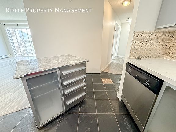 5th image of 4000 Somervale Ct SW Unit 403