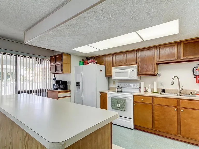 9433 Harbor Greens Way #404 — Photo 21