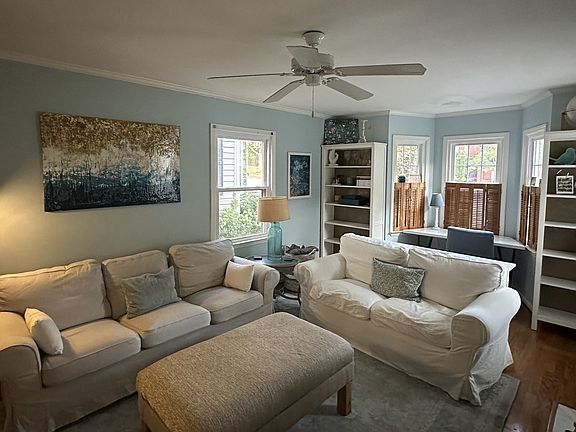 living room fully furnished as is