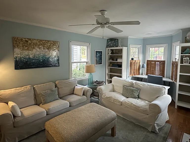 living room fully furnished as is