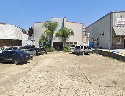 Private Parking area. Stairs to the apartments on the left side.