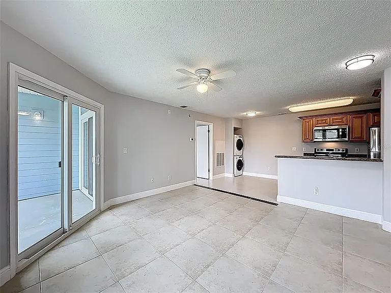 Living room/washer dryer/kitchen