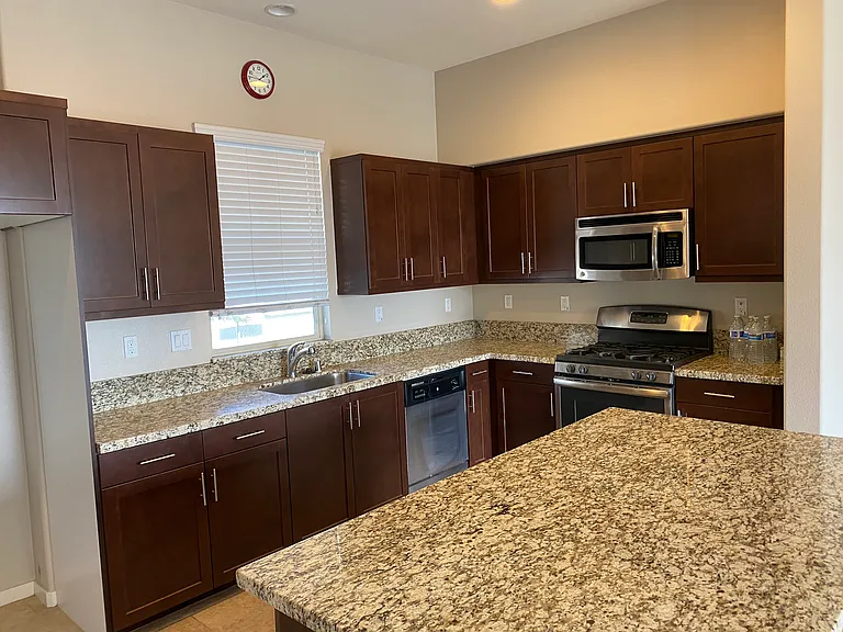 kitchen - granite counter, island.
