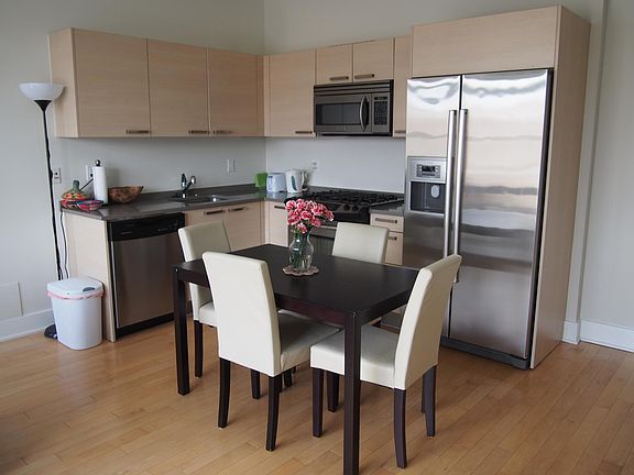 Beautiful open kitchen with stainless steel appliances