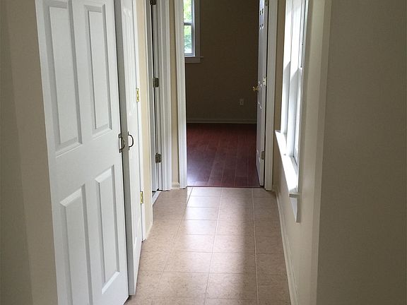 Hallway to laundry closet, bath and bedroom.