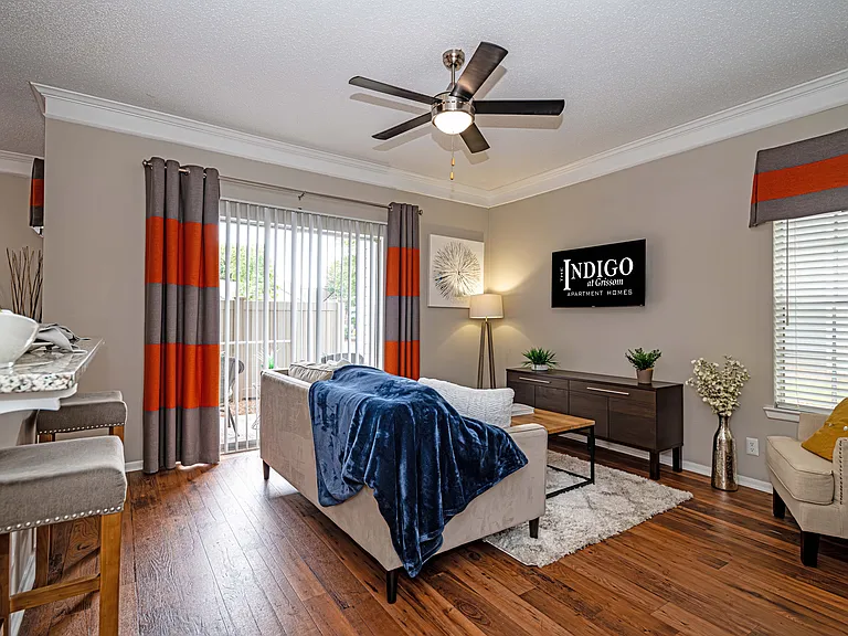 Spacious living room with hardwood-style flooring