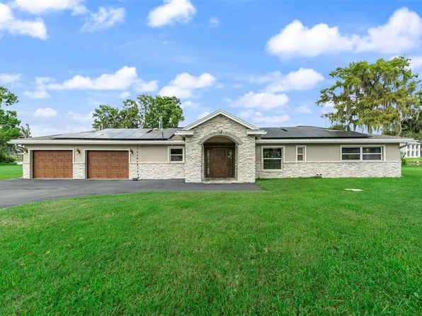 1002 LOVES POINT DRIVE, LEESBURG, FL 34748