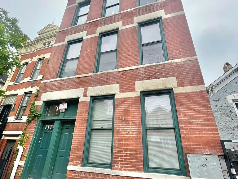 1629 S Throop St — Photo 1