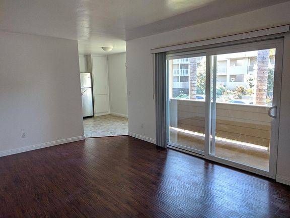 Living Room; stock photos of similar unit (available unit is ground floor and does not have a balcony).