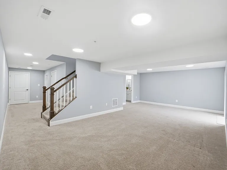 Massive basement with fifth bedroom and en-suite full bath, that can be used as an in-law suite, second living area, or kids play area.